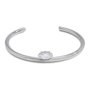 Minimalist stainless steel open bangle featuring an oval-cut cubic zirconia in silver finish
