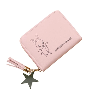 Pink minimalist rabbit coin purse with tassel and star pendant on a white background