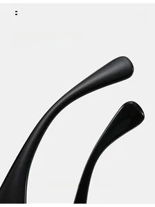 Detail of curved ergonomic temple tips on black sunglasses for comfortable wear