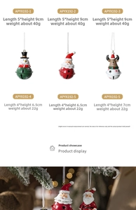Detail of colorful Nordic painted Christmas bells with snowman and reindeer designs