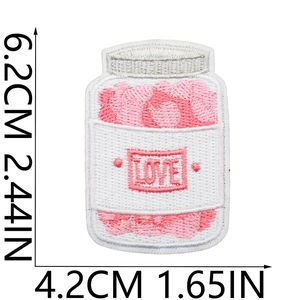 Detail showing the 6.2cm by 4.2cm dimensions for the pink LOVE jar embroidery patch