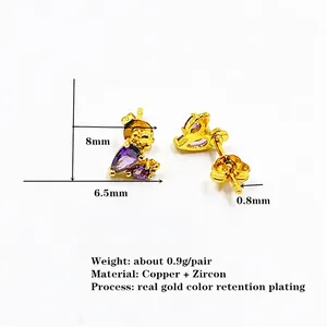 Elegant gold heart earrings with purple zircon and teardrop accents for women