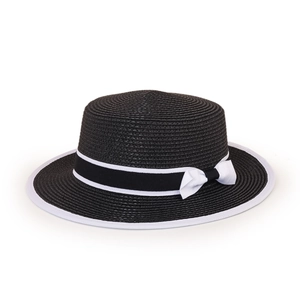 Detail of the high-quality black boater straw hat with contrast white piping and bow