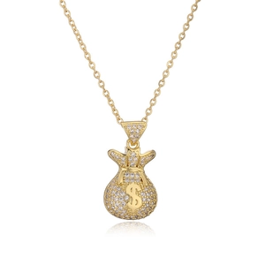 Detailed close-up of a gold-plated money bag pendant with cubic zirconia and dollar sign
