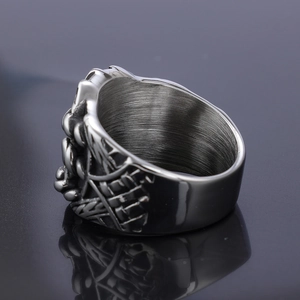 Macro shot of Viking stainless steel ring featuring relief details and brushed metal interior