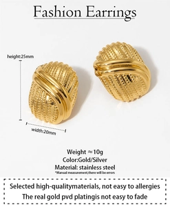 Detail view of 25mm gold-plated stainless steel oval button earrings with ribbed texture