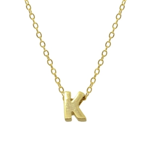 Detailed close-up of 925 silver O-chain and gold letter K pendant necklace on white background