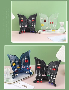 Detailed butterfly acrylic earring organizer in black, clear and blue colors