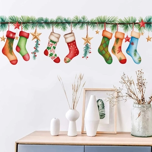 Colorful Christmas stockings and pine branch wall stickers for festive home decoration