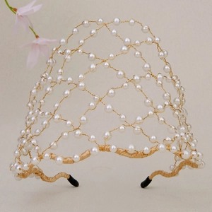 Elegant bridal pearl headband with gold woven wire and starry white pearls