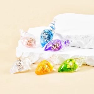 Luminous conch glass charms with small shells and colorful liquids for DIY jewelry crafts