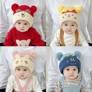 Cute baby winter knit hat with pom poms and animal embroidery in four vibrant colors