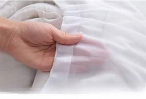 Close-up of fine mesh laundry bag texture for delicate clothing and underwear protection
