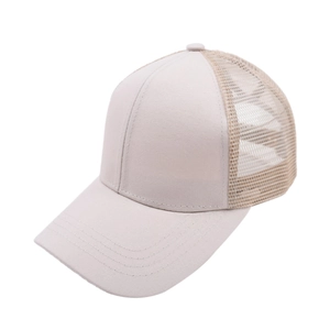 Detailed view of beige trucker hat with breathable mesh back and curved brim stitching