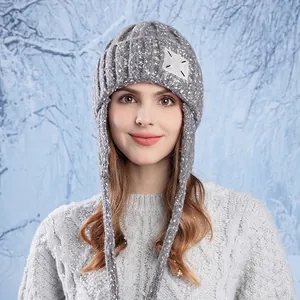 Women's grey winter knit beanie with ear flaps and thick fleece lining for warmth
