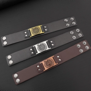 Vintage pirate PU leather bracelet set for men featuring engraved dragon and compass metal charms