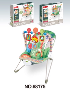 Detail view of baby rocker with cartoon lion pattern and music vibration control panel