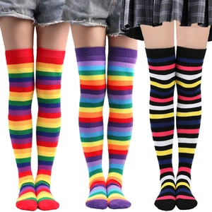 Vibrant rainbow over-the-knee striped cotton socks for festive party wear.