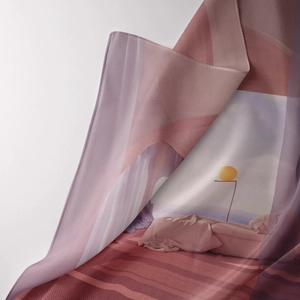 Close-up of bohemian wall tapestry showing soft fabric texture and artistic print