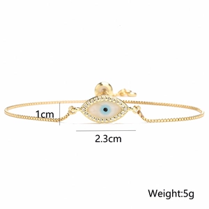 Detailed dimensions of 18K gold evil eye bracelet showing 2.3cm width and 1cm height