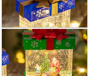 Close-up of a Christmas lantern water globe with Santa scene and swirling glitter