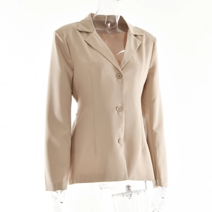 Detailed view of beige long-sleeve blazer with classic lapel and three-button closure