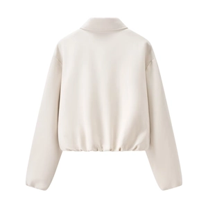 Vue détaillée du dos d'une veste beige zippée avec ourlet élastique et épaules tombantes