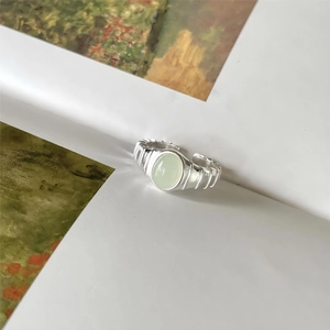 925 sterling silver adjustable oval green crystal ring with wavy textured band design