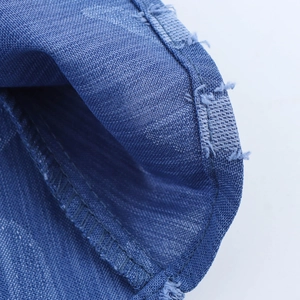 Women denim jacquard two-piece set featuring sleeveless vest and frayed edge long skirt