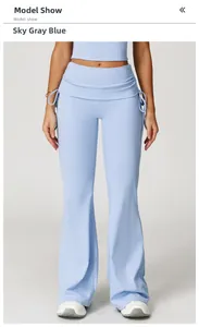 Detail of high-waist flared yoga pants in Sky Grey Blue with side drawstring design