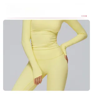 Detail of high-waist yellow yoga set showing tummy control and extended hem fit