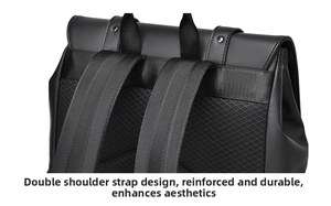 Detail of wide reinforced shoulder straps and breathable mesh back on the black backpack