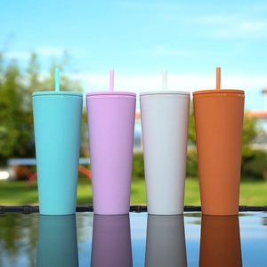 Row of four colorful matte plastic straw cups in cyan, purple, white and orange finishes