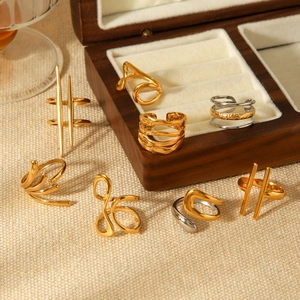 Irregular irregular stainless steel rings in gold and silver finish with wave lines
