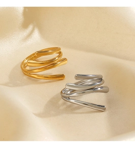 Detail view of multi-layer 18K gold and silver plated stainless steel chunky rings
