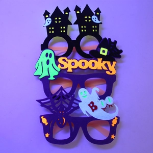 Close-up of three spooky Halloween felt glasses with Spooky and BOO designs