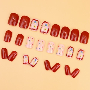 Short wine red and pink floral press-on nails with sweet polka dot patterns for women
