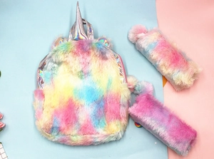 Plush rainbow unicorn backpack and matching stationery pouches with holographic ears detail