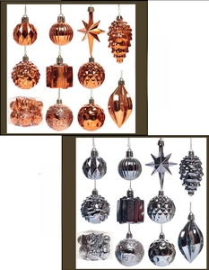 Close-up of assorted electroplated Christmas ornaments in antique copper and iron gray finishes