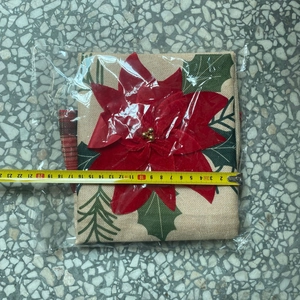 Detail of Christmas chair cover showing the dimensions on measuring tape