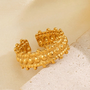 Irregular golden stainless steel open ring with vintage beaded texture and metallic luster