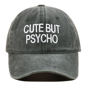 Detail view of charcoal grey washed baseball cap with white CUTE BUT PSYCHO embroidery