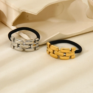 Set of gold and silver croissant metal ponytail holders with black elastic bands