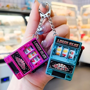 Creative mini fruit slot machine keychains in pink and blue with lucky slot designs