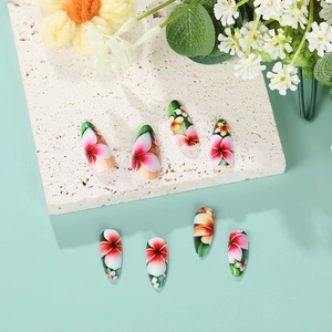 Floral press on nails in almond shape with colorful tropical hibiscus flower designs