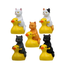 Set of five miniature resin cats riding yellow ducks for creative garden landscaping