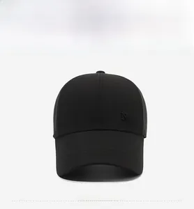 Detailed close-up of 3D embroidered N.Y.S letters on side of black cotton baseball cap