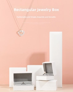 Minimalist white textured leather jewelry boxes with grey velvet interior for rings