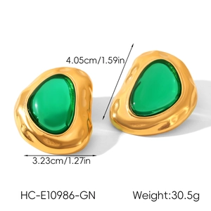 Detailed view of vintage irregular 18k gold earrings with green resin stones and dimensions