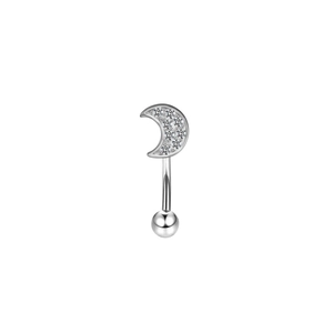Macro view of stainless steel curved eyebrow ring with sparkling crescent zircon stones